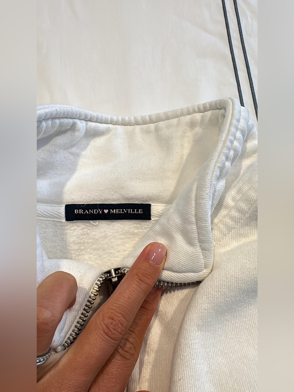 Brandy Melville
White quarter zip - Picture 2 of 2